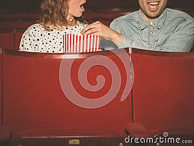 Couple watching a film in a movie theater Stock Photo