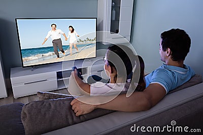 Couple Watching Movie Together Stock Photo