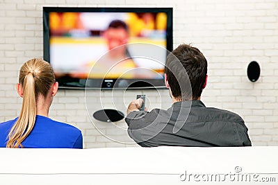 Couple watching tv Stock Photo