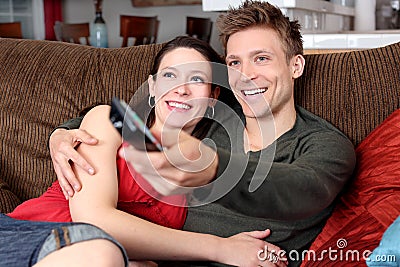 Couple watching TV Stock Photo