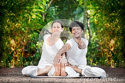 Couple yoga in India Stock Photo