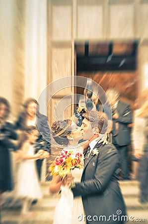 Couple of young lovers kissing during wedding cerimony Stock Photo