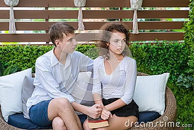 Couples are angry with each other, the male side is asking for reconciliation. Stock Photo