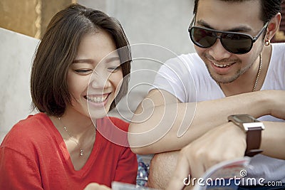 couples of asian younger man and woman laughing happiness emotion ,traveling destination Stock Photo