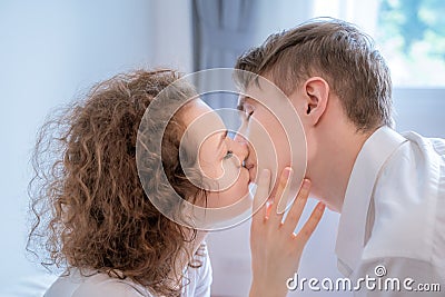 Couples are kissing passionately on the bedroom Stock Photo