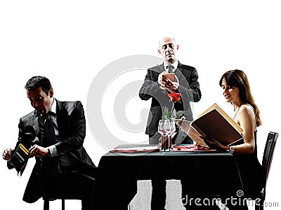 Couples lovers dating dinner silhouettes Stock Photo
