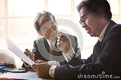 Couples of senior partner business man meeting with serious prob Stock Photo