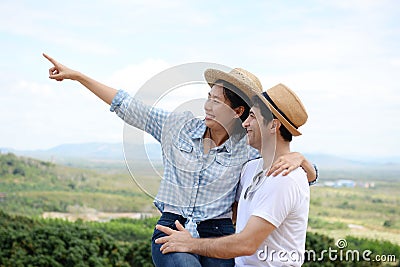 Couples showing love and happy to travel anywhere. Stock Photo