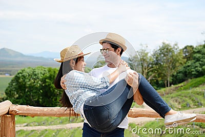 Couples showing love and happy to travel anywhere. Stock Photo