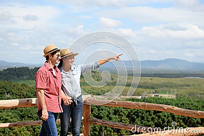 Couples showing love and happy to travel anywhere. Stock Photo