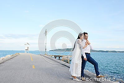 Couples showing love and happy to travel anywhere. Stock Photo