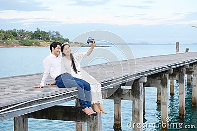 Couples showing love and happy to travel anywhere. Stock Photo