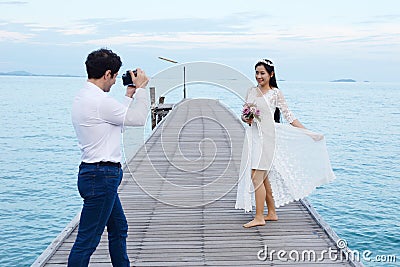 Couples showing love and happy to travel anywhere. Stock Photo