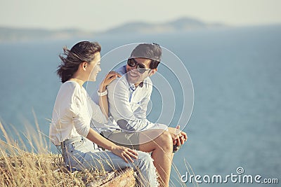 Couples of younger asian man and woman relaxing with happiness o Stock Photo