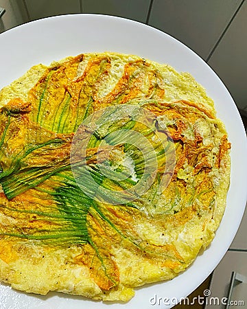 Courgette flower omelette, yellow courgette flowers, fresh egg omelette, healthy food, produce from your own garden, summer food Stock Photo