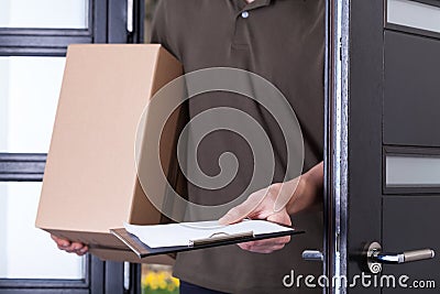 Courier asking for a sign Stock Photo