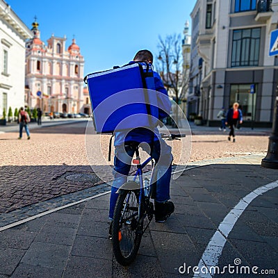 Courier On Bicycle Delivering Food European City Editorial Stock Photo