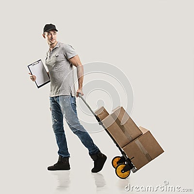 Courier handcart pull boxes and packages Stock Photo