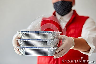 Courier hold go box food, delivery service, Takeaway restaurants food delivery to home door. Stock Photo