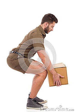 Courier picking up a package. Stock Photo