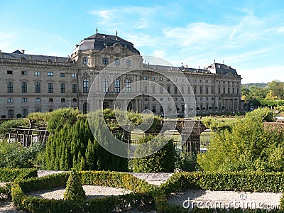 Court garden with water fontaine, stairs, hedges and geometrical beds Stock Photo