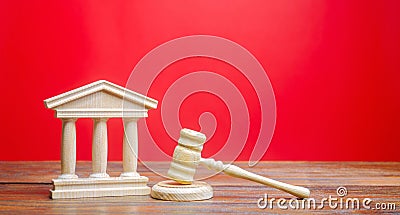 Courthouse and gavel. International Court. Protection of business interests and human rights. Intellectual property. Justice and Stock Photo