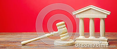 Courthouse and gavel. International Court. Protection of business interests and human rights. Intellectual property. Justice and Stock Photo