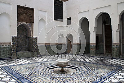 Courtyard with fountain and zellige tiled floor at Dar Si Said Stock Photo