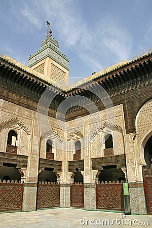 Courtyard and minaret of the Madrasa Bou Inania in Fez, Morocco Stock Photo