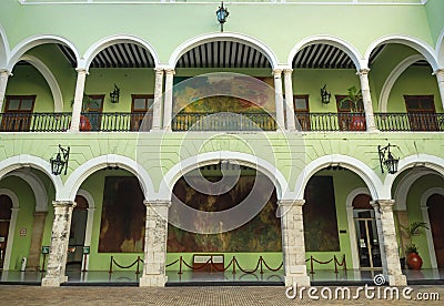 The courtyard of the `Palacio de Gobierno`, the Government Palace with paintings by Fernando Castro Pacheco in Merida, Mexico Editorial Stock Photo