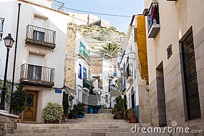 Courtyard in Santa Cruz old historic district of Alicante stairway leading to Santa Barbara mountain Editorial Stock Photo