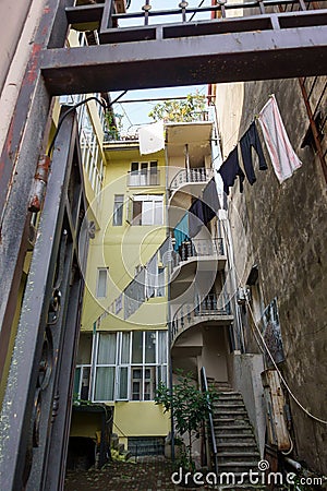 Courtyard of shabby apartment building Stock Photo