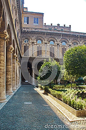 Courtyard with trees and a fountain in the Doria Pamphili Gallery Stock Photo