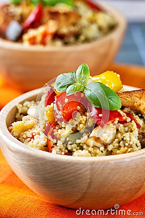 CousCous Bowl whit Meat and Mixed Grilled Vegetables Stock Photo