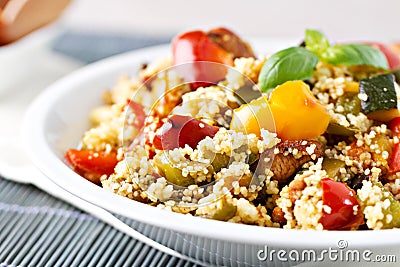 CousCous Bowl whit Meat and Mixed Grilled Vegetables Stock Photo