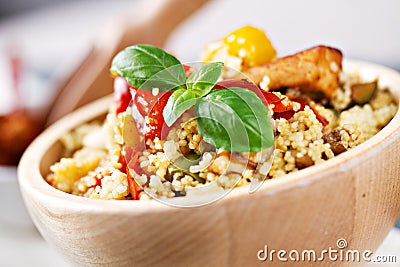 CousCous Bowl whit Meat and Mixed Grilled Vegetables Stock Photo