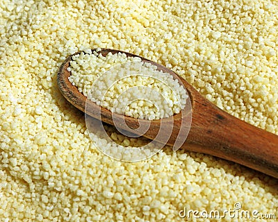 Couscous closeup with spoon Stock Photo