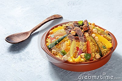 Couscous with meat and vegetables, festive Moroccan dinner Stock Photo