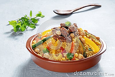 Couscous with meat and vegetables, festive Moroccan dinner Stock Photo