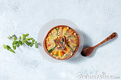Couscous with meat and vegetables, festive Moroccan dinner, overhead shot Stock Photo