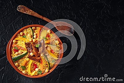 Couscous with meat and vegetables, festive Moroccan dinner, overhead shot Stock Photo