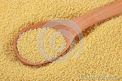 Couscous in a spoon Stock Photo