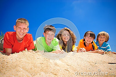 Cousins on sand Stock Photo