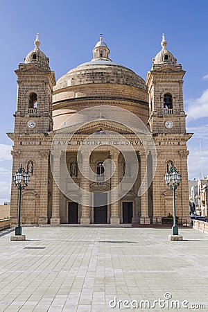 Coutyard and facade of St. Mary`s church at Mgarr on Malta. Stock Photo