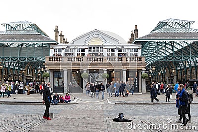 Covent Garden Market surrounded by historical buildings, theatres and entertainment facilities in Westminster City, Greater London Editorial Stock Photo