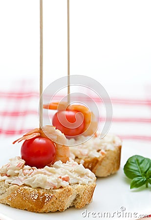 Cover with mayonnaise and shrimp with cherry tomatoes Stock Photo