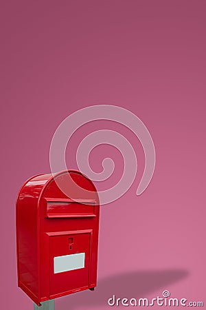 Cover page with big fancy red metal postbox with white empty note space for address isolated at pink gradient background with copy Stock Photo