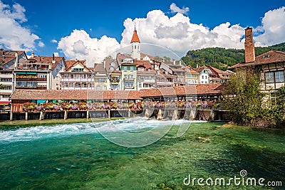 Covered bridge, church, castle and river view in Thun Switzerland Editorial Stock Photo
