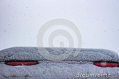 Covered with snow stop signals a sports car Stock Photo