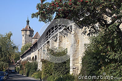 Covered walkway on old city wall with Klingentor in background Stock Photo